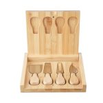 A bamboo cheese board set featuring a hinged lid and five cheese utensils. The wood has a natural finish.