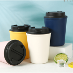 A drink bottle set featuring four thermo cups in pink, yellow, white, and navy, with black lids and a logo.