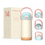 A drink bottle in pastel pink and blue, with a handle, displayed alongside its packaging. Contains 420ml capacity.