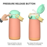 A drink bottle in pink and green, featuring a pressure release button and a removable lid with a straw.