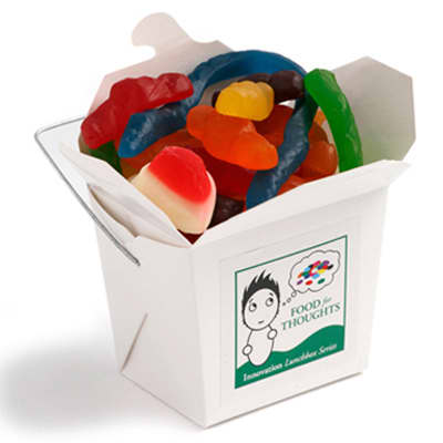 A white cardboard noodle box filled with colourful mixed lollies, including gummy worms and assorted fruit shapes. A white cardboard noodle box filled with colourful mixed lollies, including gummy worms and assorted fruit shapes.