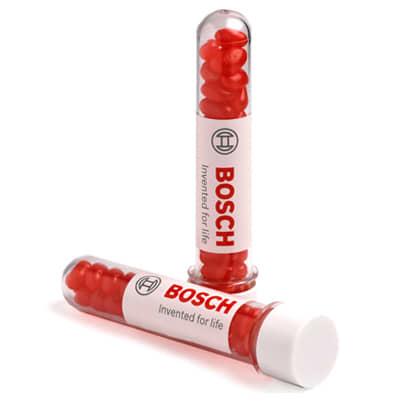A test tube containing red jelly beans, with a branded label and transparent cap. Test Tube with Mini Jelly Beans 40g - Image 1