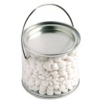 A medium clear PVC bucket filled with white chewy mints, featuring a silver lid and handle.