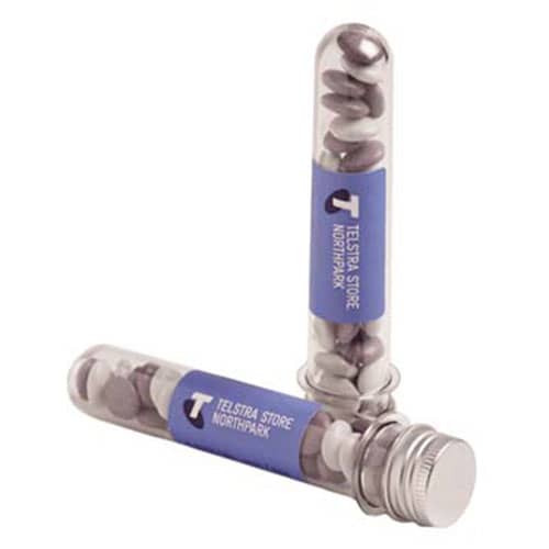 A transparent test tube filled with chocolate beans, featuring a blue label and silver lid. Test Tube with Choc Beans 40g - Image 1