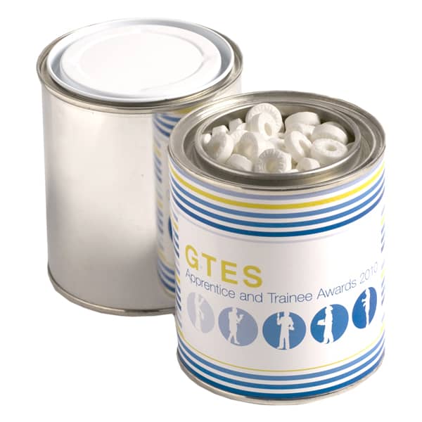 A painted tin filled with white mints, featuring a colourful design and a lid. A painted tin filled with white mints, featuring a colourful design and a lid.