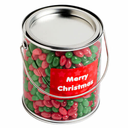 A metal bucket filled with red and green jelly beans, featuring a Christmas-themed label. Big PVC Bucket with Christmas Jelly Beans 950G - Image 1