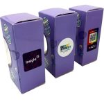 Three purple chocolate boxes featuring a window, with branding on the sides. Each box is decorated with Easter-themed graphics.