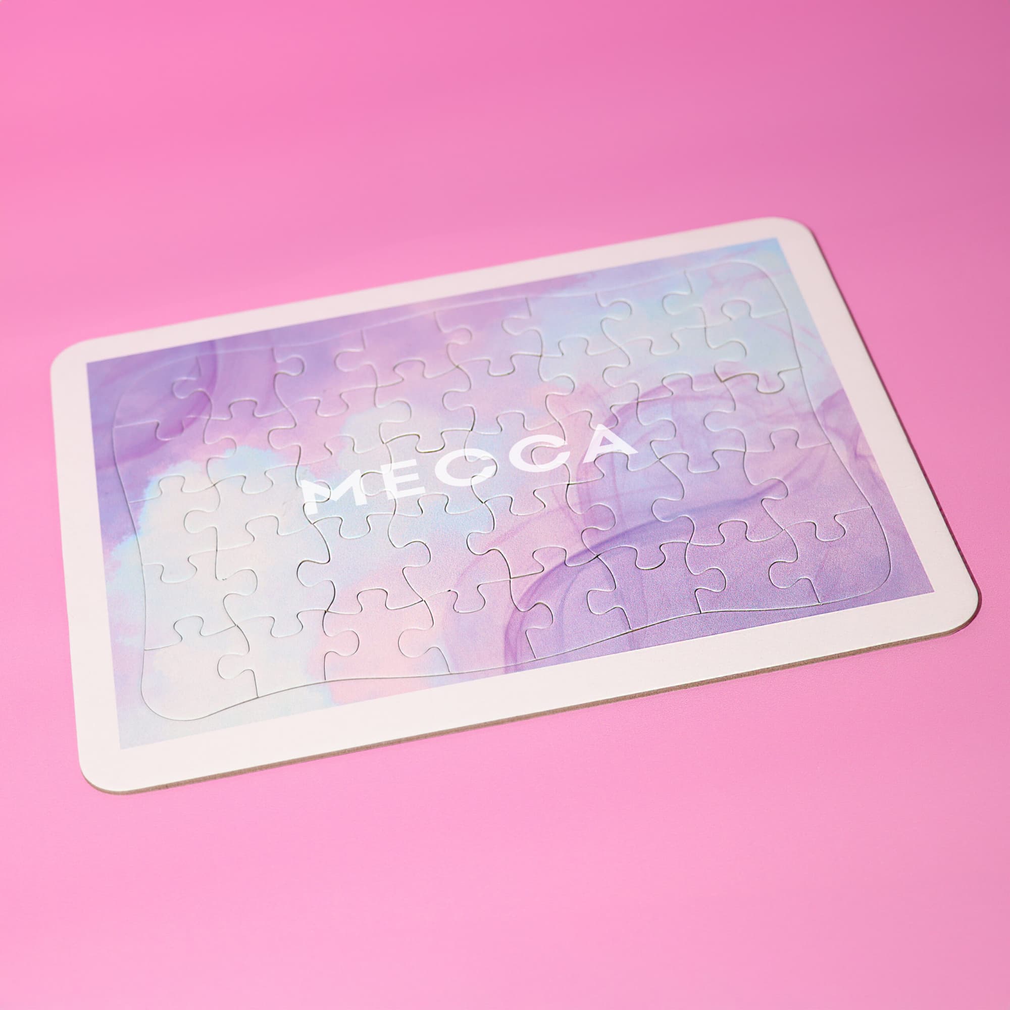 A jigsaw puzzle featuring soft pastel colours with a smooth surface. The puzzle has a logo on it. 40pcs Jigsaw Puzzle - Image 1