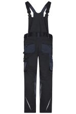 Workwear pants with bib in black and navy, featuring multiple pockets and adjustable straps. Includes branding.