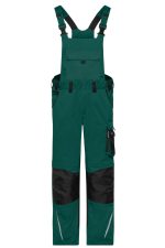 Workwear pants with bib in teal and black, featuring adjustable straps and multiple pockets. Includes a logo.