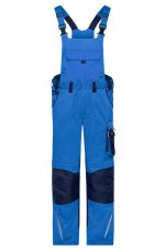 Blue workwear pants with bib featuring adjustable straps and navy accents, designed for durability and comfort.