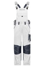Workwear pants with bib in white and navy, featuring adjustable straps and multiple pockets. Includes branding.