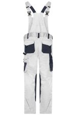 Workwear pants with bib in white and navy, featuring multiple pockets and adjustable straps, with a logo present.