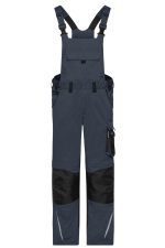 A pair of navy blue workwear pants with bib, featuring black accents and multiple pockets.