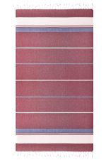A striped beach blanket featuring shades of red and blue with tasselled edges, along with a brand logo.