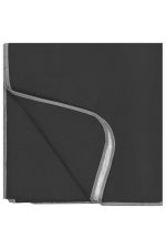 A black picnic blanket with a grey trim, folded neatly, featuring a logo on one corner.
