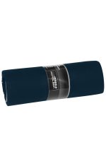 A rolled navy picnic blanket with a branded label wrapped around it.