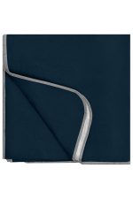 A navy picnic blanket with a light grey trim, neatly folded. The blanket features a logo in one corner.