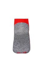 A grey sneaker sock with a red top and a logo on the side.