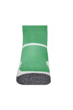 A pair of short sports socks in vibrant green with a grey heel. Features a logo on the side.