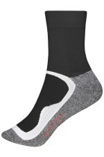 A pair of black sports socks featuring a grey and white design, with a visible logo.