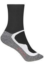 Sport socks featuring a black upper and grey sole, with a logo on the side.
