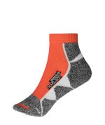 Sport sneaker socks featuring an orange and grey design with a logo. Mid-calf style suitable for athletic wear.
