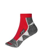 Sport sneaker socks in red and grey, featuring a patterned design and a logo on the side.