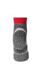 A pair of grey sport sneaker socks with a red cuff, featuring a logo on the side.