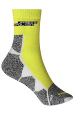 A pair of sports socks featuring a bright yellow design with grey accents and a logo on the cuff.