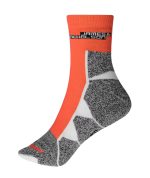 A pair of sports socks featuring an orange upper and grey patterned lower section, with a logo on the cuff.