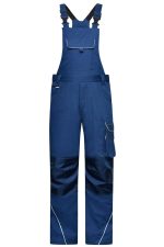 Blue workwear pants with bib and adjustable straps, featuring pockets and contrasting dark panels. Includes a logo.