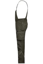 Workwear pants with bib in dark green, featuring multiple pockets and a logo. Suitable for rugged use.