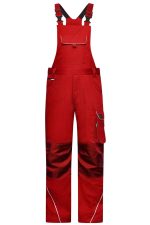 Bright red workwear pants with bib featuring adjustable straps and various pockets. Includes branding details.