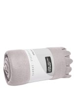 A rolled grey fleece blanket with a white branded band around it.