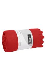 A rolled red fleece blanket with a branded wrapper, featuring a smooth texture.