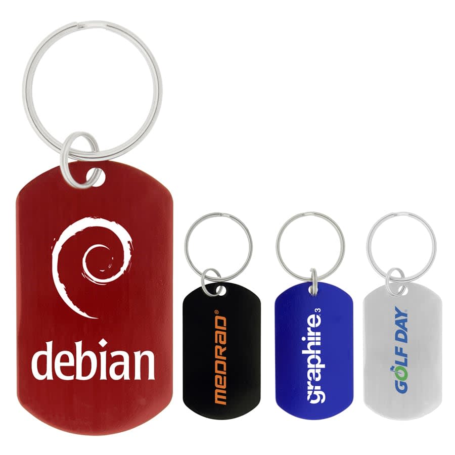 A set of four dog tag keychains in red, black, blue, and silver, each with a keyring and featuring various logos. Dog Tag Keychain - Image 1