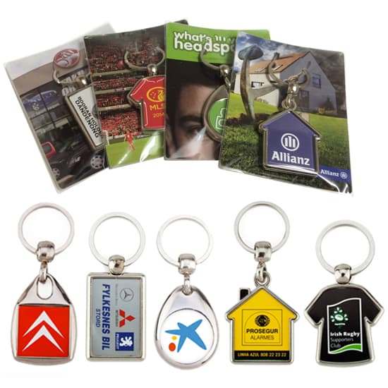 A collection of metal key rings on backing cards, featuring various designs and colours, packaged in poly bags. A collection of metal key rings on backing cards, featuring various designs and colours, packaged in poly bags.