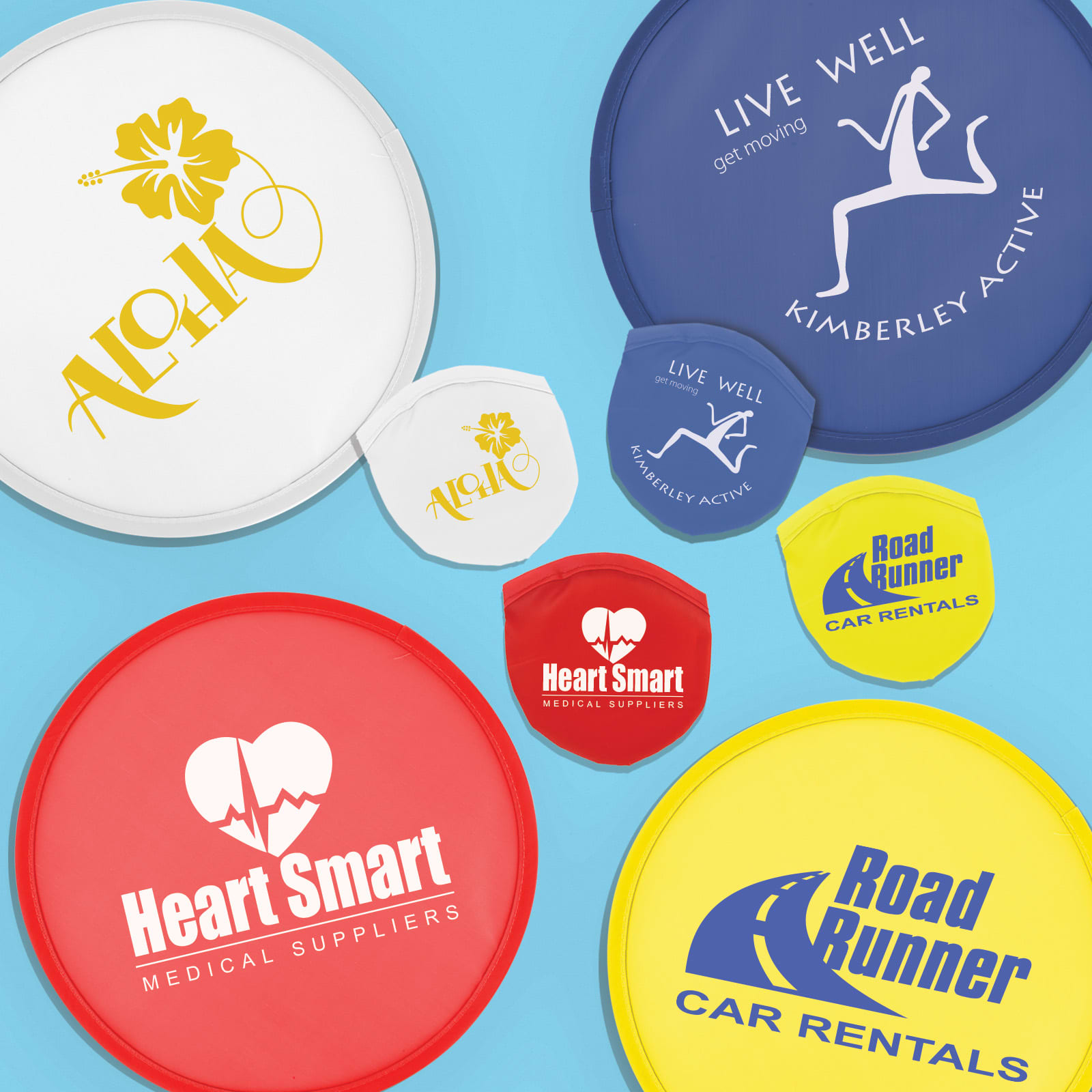 A collection of colorful promotional frisbees in white, blue, red, and yellow, featuring various logos and designs. Fling Thing - Image 1