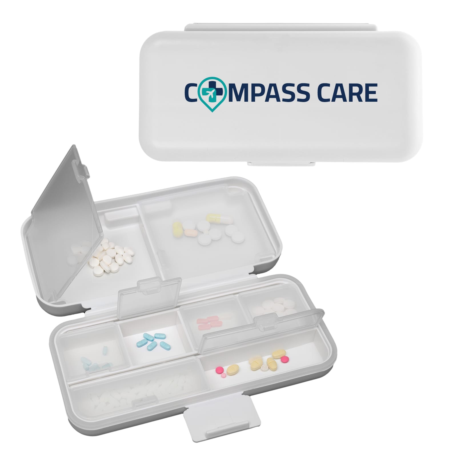 A white compact pill organiser with multiple compartments, featuring a logo on the lid and various coloured pills inside. Compact Pill Organiser - Image 1