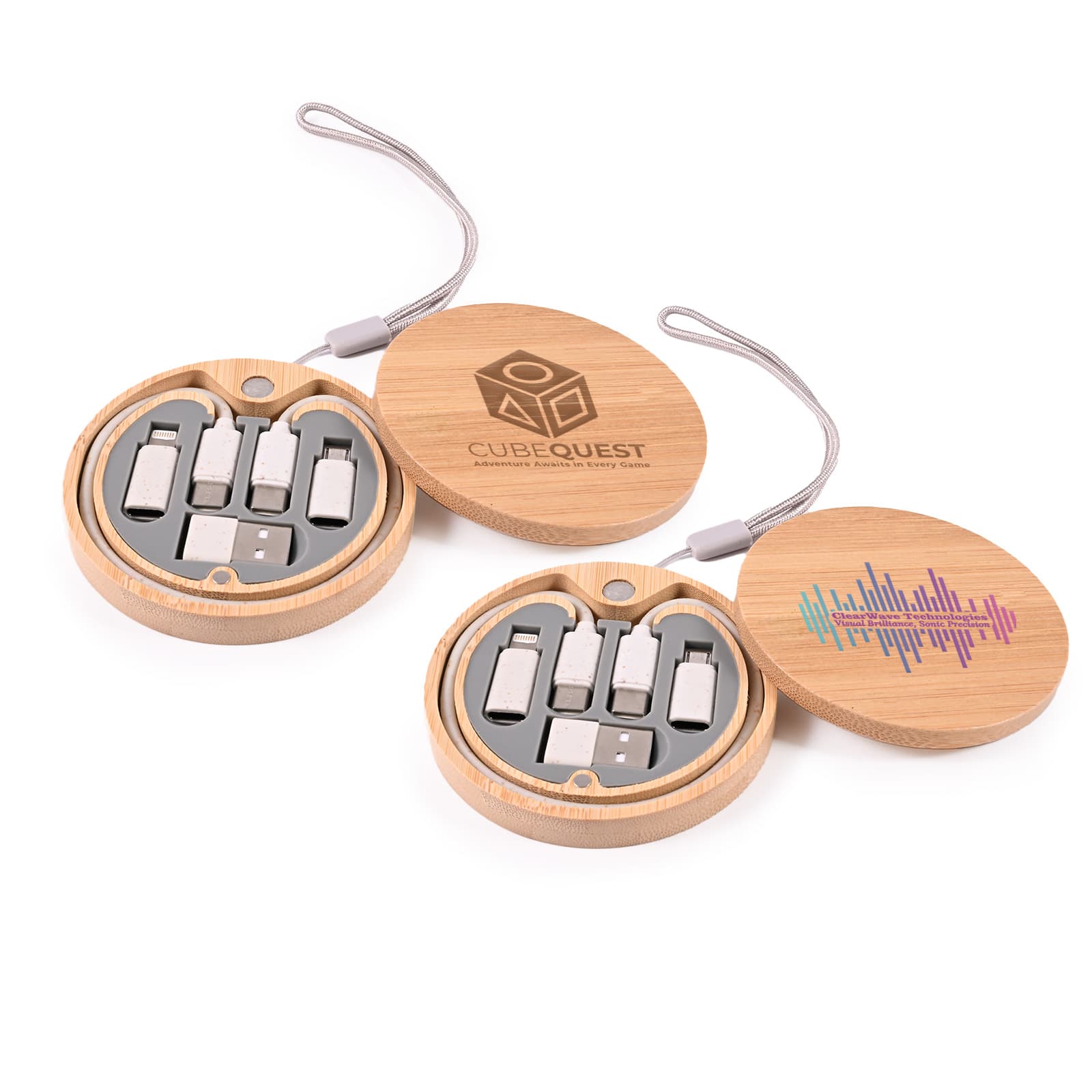 A circular bamboo case containing various charging cables in silver and grey, featuring a logo on the lid. Reveal Circle Cable Set - Image 1