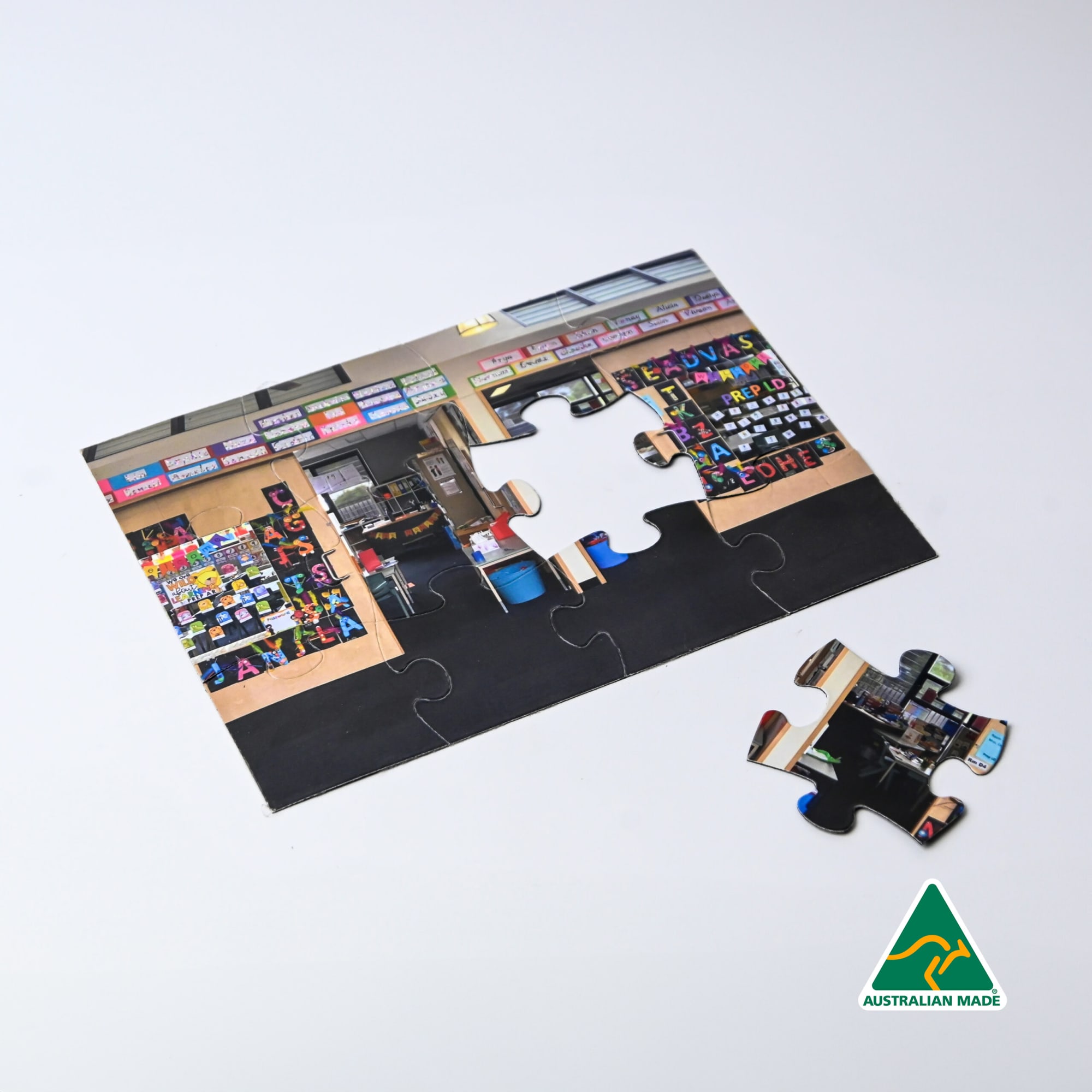 A5 Magnetic Jigsaw featuring a vibrant image of a shop with various products displayed. Includes a loose puzzle piece. A5 Magnetic Jigsaw - Image 1