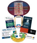 A collection of promotional fridge magnets featuring various designs, colours, and branding from different organisations.
