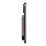 A thin, rectangular magnetic wireless power bank in black and gold, positioned beside a smartphone to show thickness.