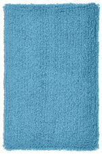A textured blue fluffy mat with a soft, inviting surface. It has a uniform rectangular shape.