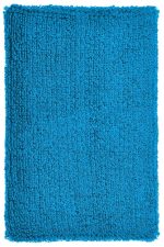 A bright blue, textured, fluffy rectangular fabric, resembling a towel or mat, with an uneven surface.