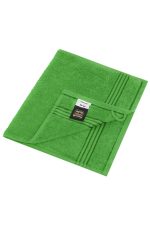 A green guest towel with a textured design and a hanging loop. The towel features a brand logo.
