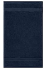 A navy blue guest towel with a textured band detail, featuring a logo at the bottom.