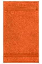 An orange guest towel featuring a textured design with subtle stripes, suitable for health and personal use.