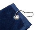 A navy blue golf towel with a grommet and clip for attachment. It features a soft texture.
